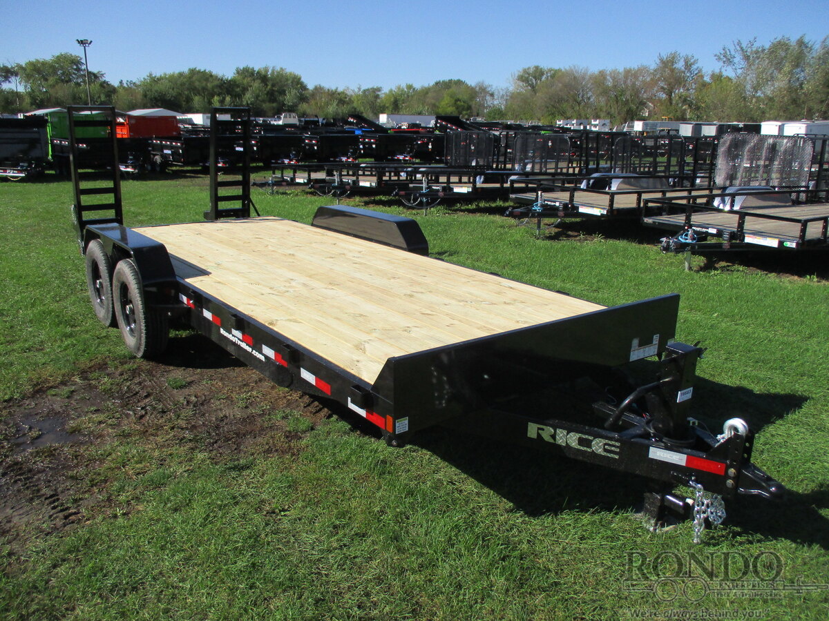 Rice FMEHR8220 20-foot tandem-axle equipment trailer with a wood deck and loading ramps
